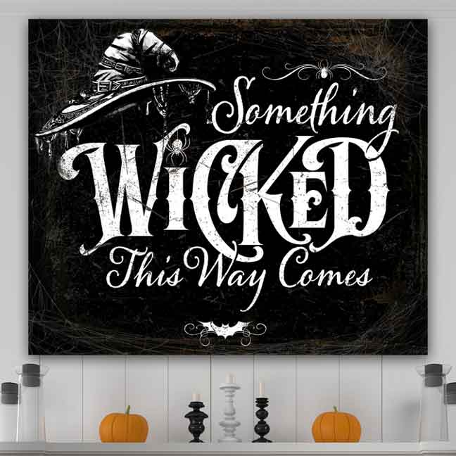 Halloween Wall Sign on Black Rustic Background with the Words Something Wicked This way Comes with spider webs