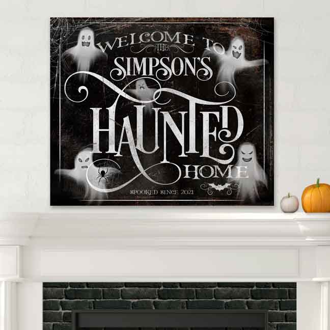 Halloween wall decor with ghost on distressed background and the words Welcome to the (family name) Haunted home, spooked since 2023