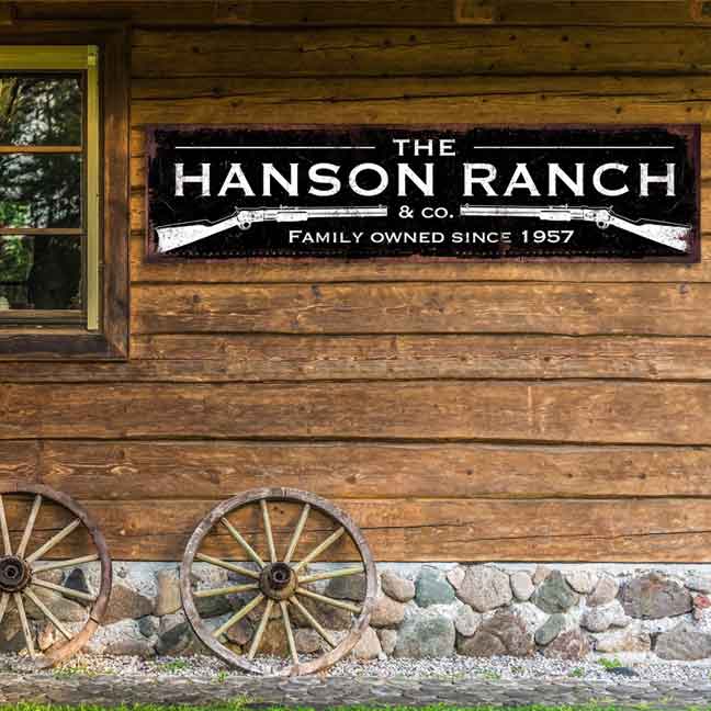 Metal Barn Sign and Ranch sign in distressed black with white print and guns