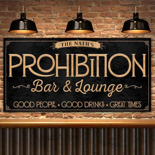 Prohibition Sign speakeasy decor in black with gold lettering that says:  (family name) PROHIBITION  bar and Lounge, good people, good drinks, great times.