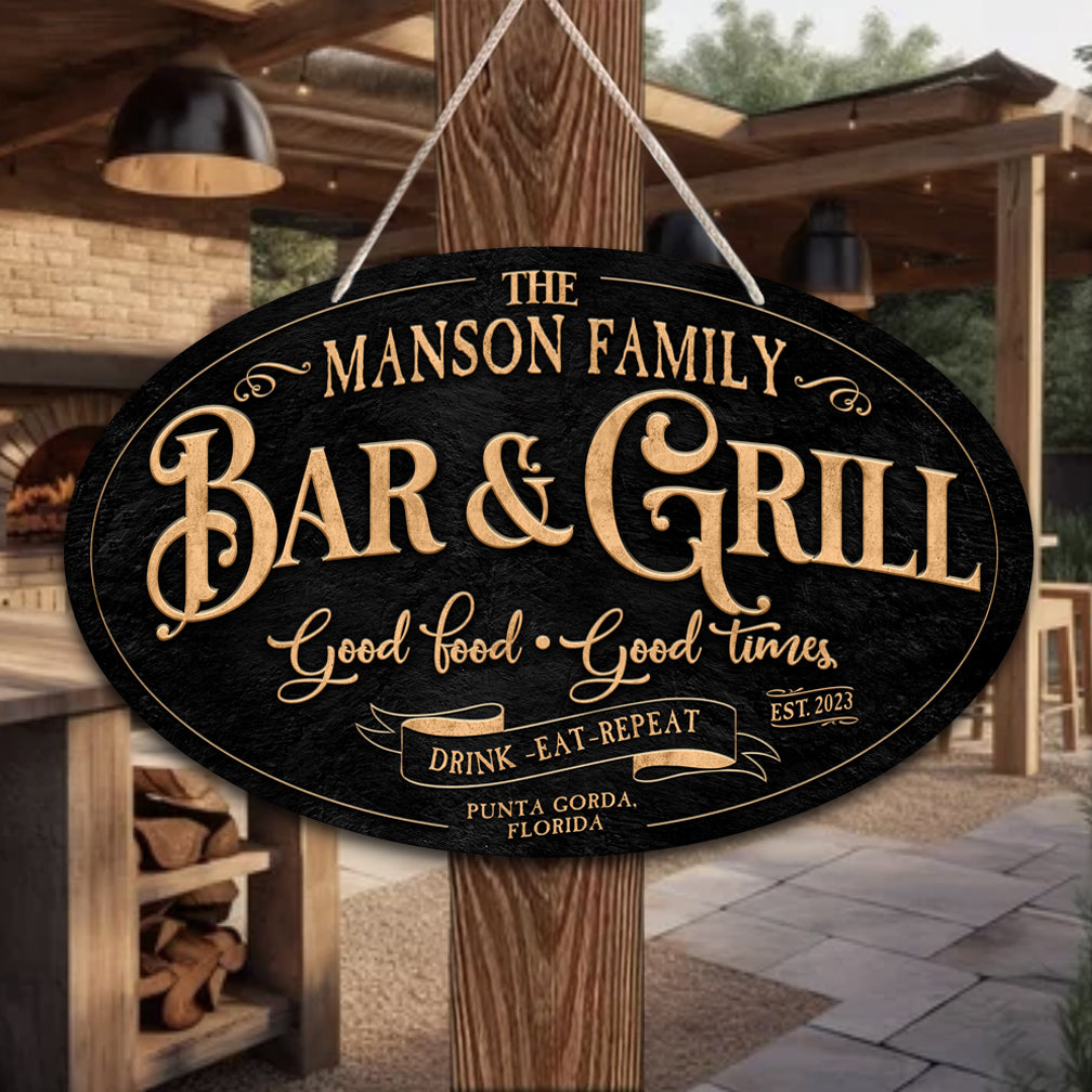 Bar and Grill - patio Sign hanging on a pole that says (family name) Bar and Grill