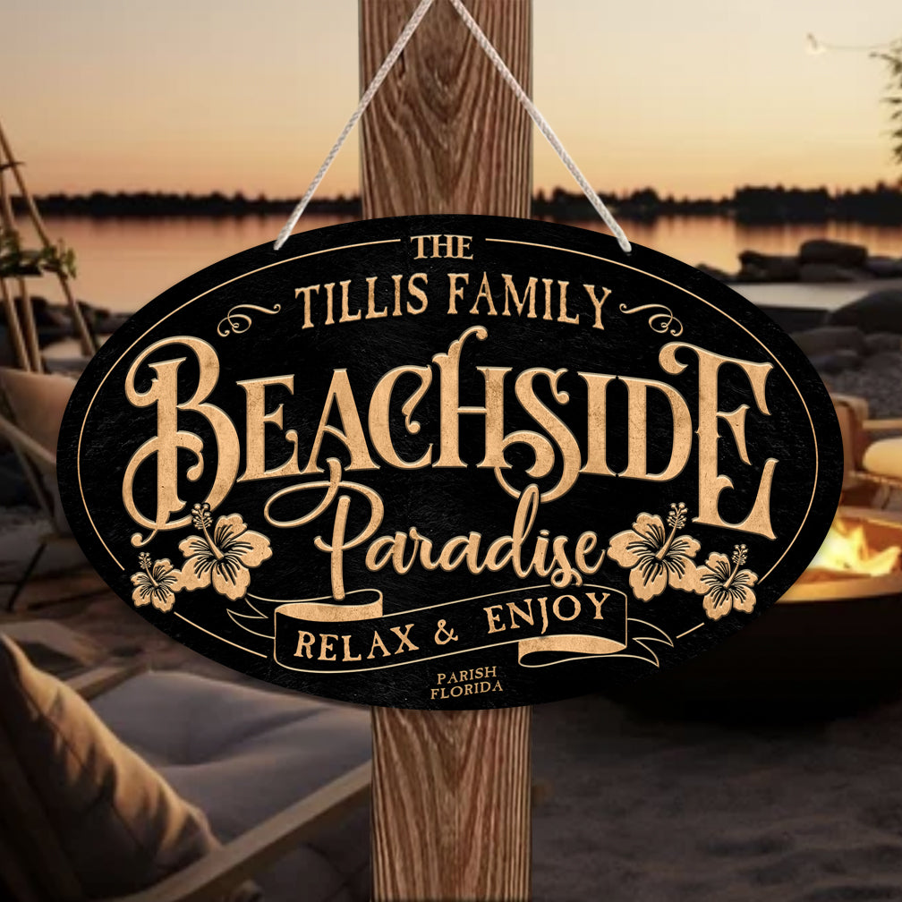beach sign coastal decor of a oval textured sign with the words: Family name Beachside Paradise Relax and Enjoy