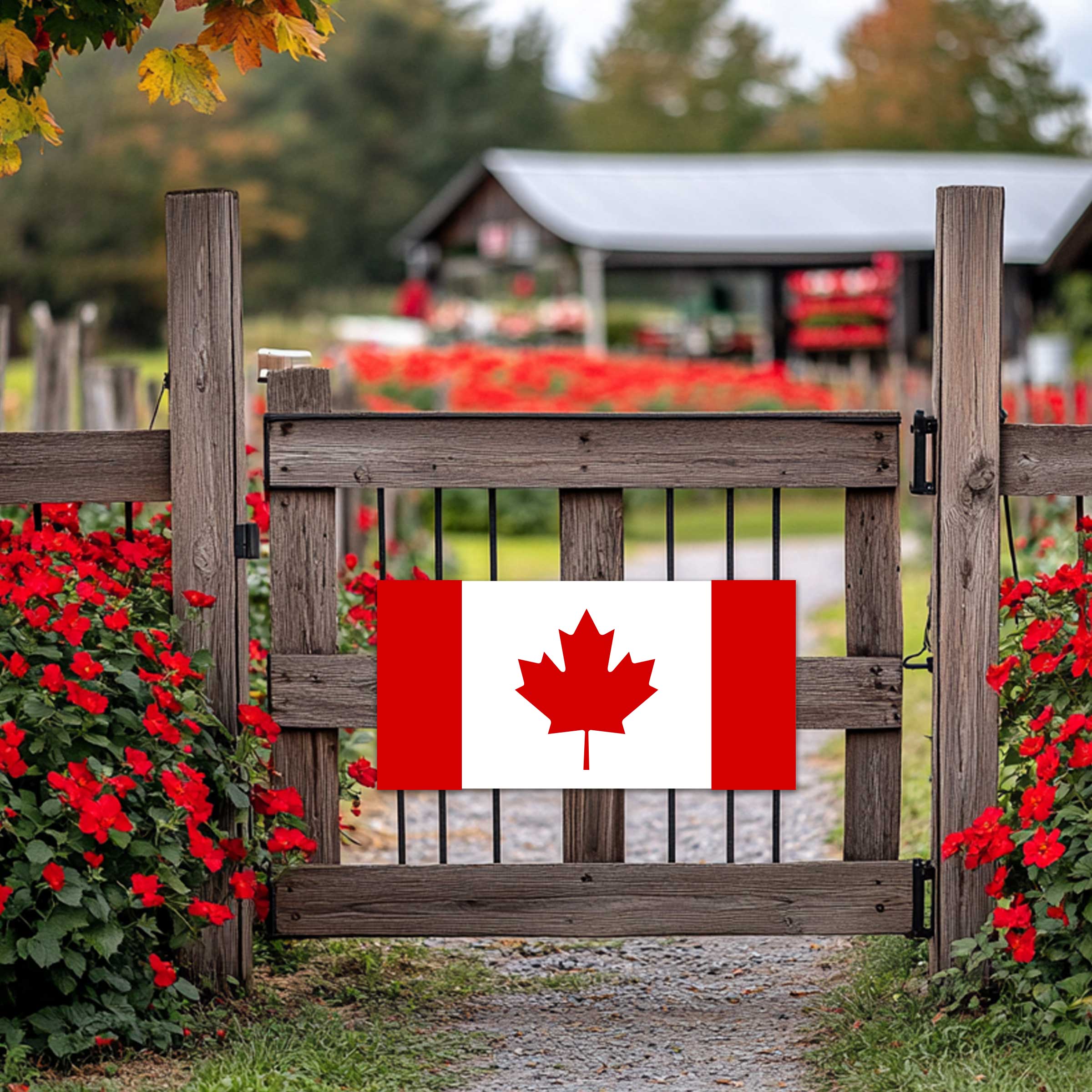 canadian flag made of metal displayed on a wooden fence.