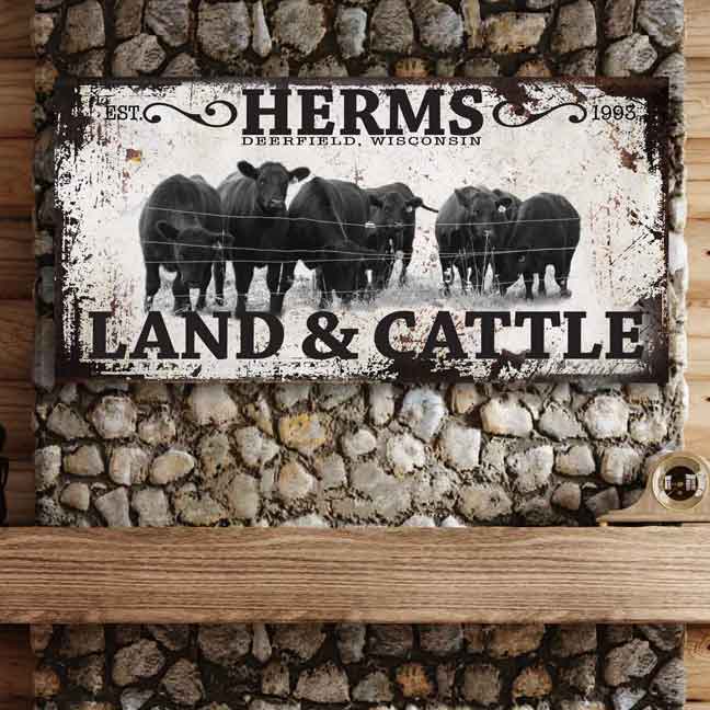 Cattle Ranch Signs Custom with black angus cows standing by the fence with the word (family name) Land and Cattle