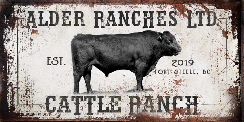 Cattle ranch signs on distressed metal.