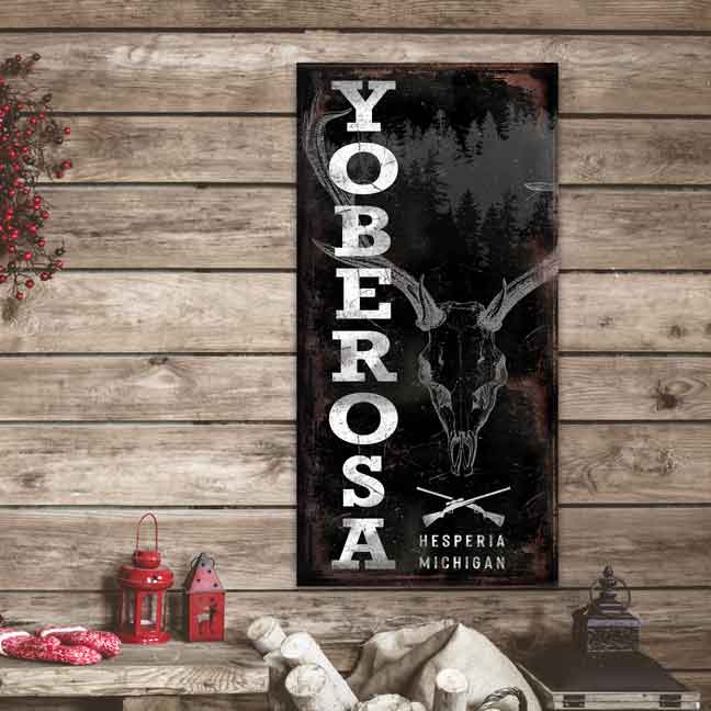 hunting-decor-sign on rusted black background with white lettering and a scull