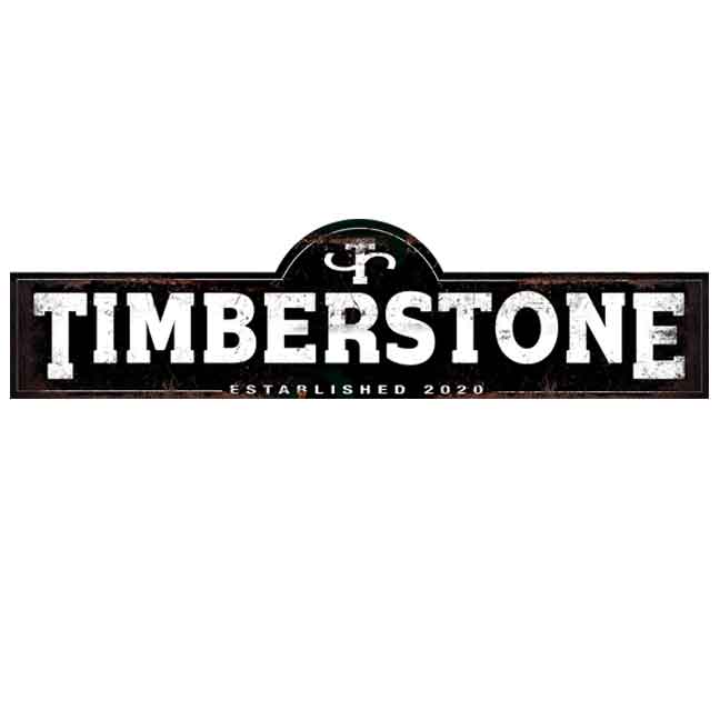 large metal barn sign cattle ranch sign large barn sign big bold white lettering with branding mark on distressed black background.
