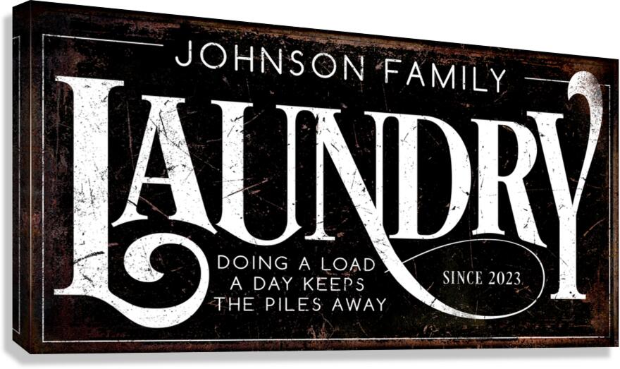 Laundry sign decor on black distressed background with family name.