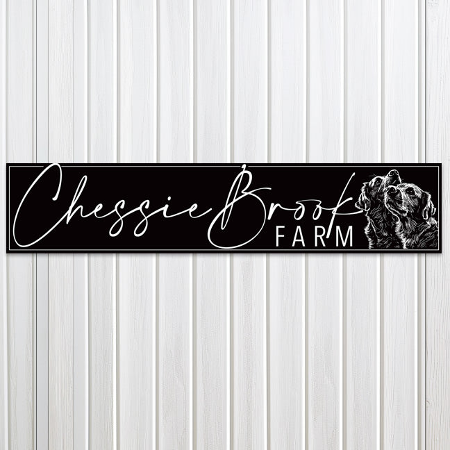 Metal barn signs on black textured background with script letters that say farm name with dogs