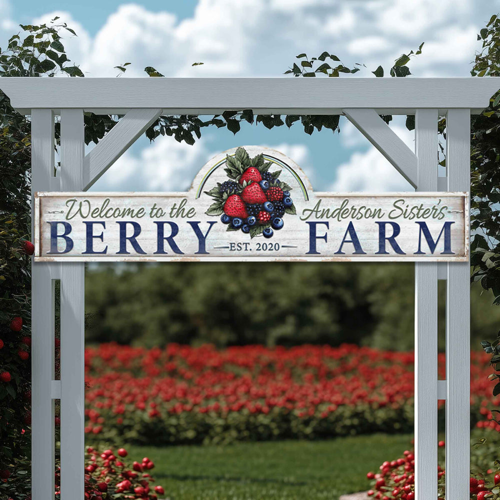 metal farm sign on two pillars for a berry farm