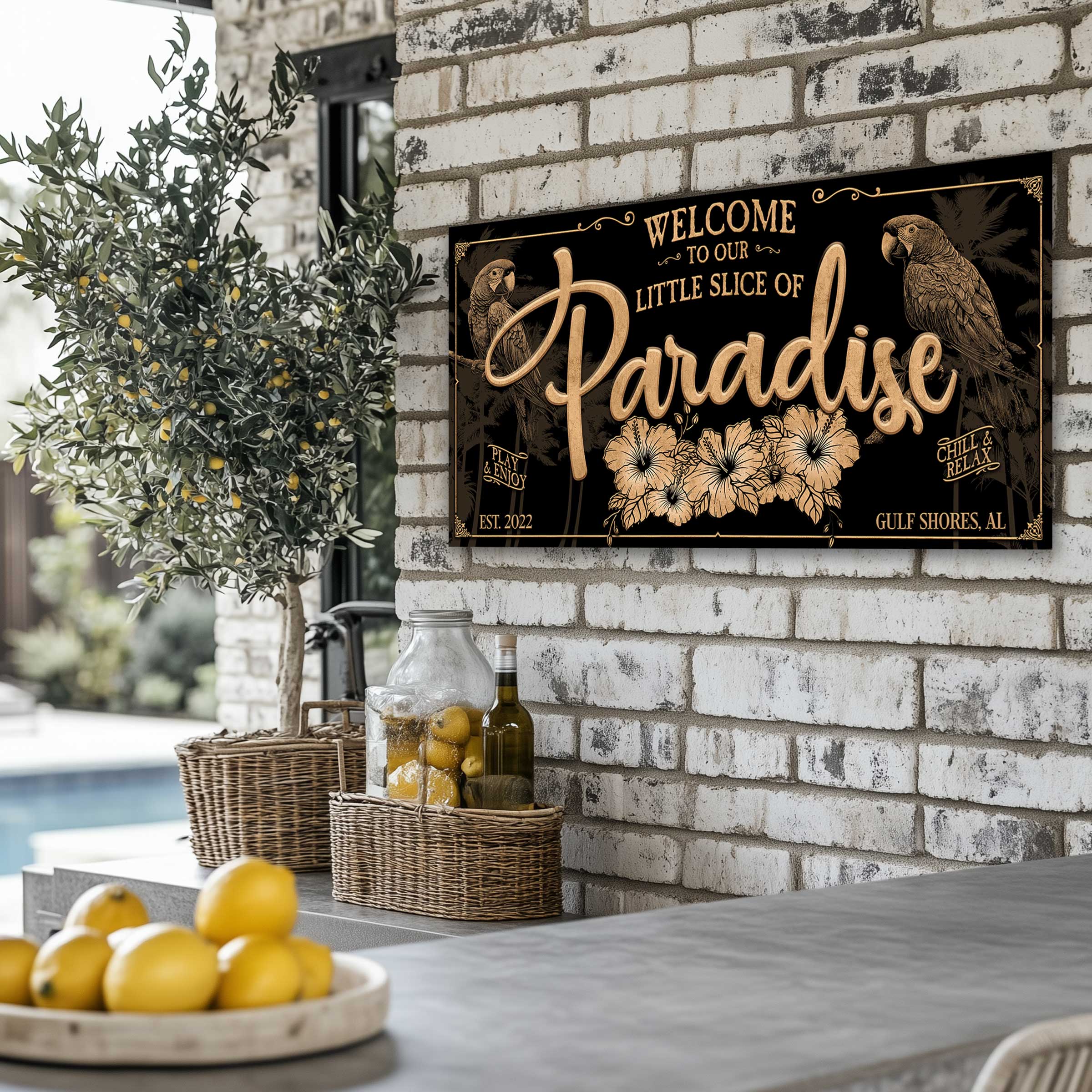 Patio Decor in gold and black that says Our little slice of paradise