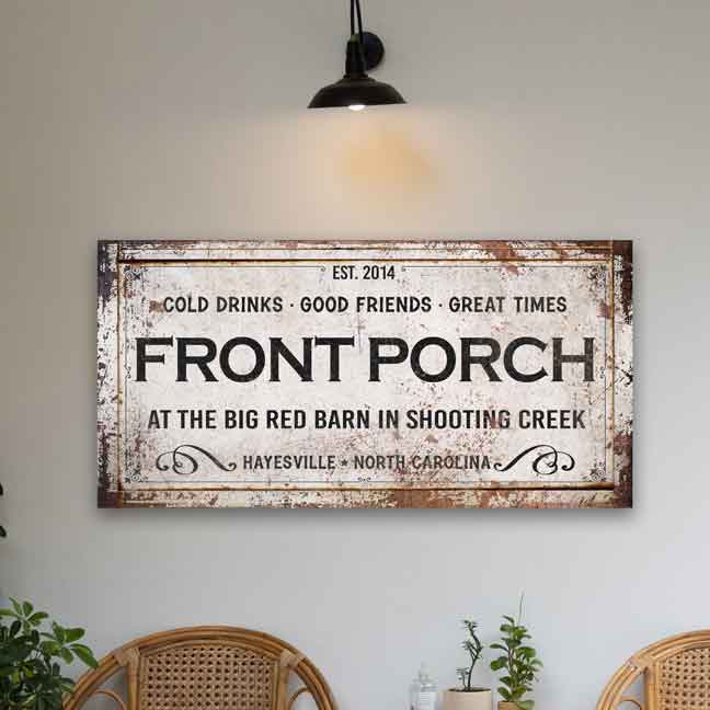 white distressed faux background sign with personalized established date, location and name of property with "front porch" in dark lettering.
