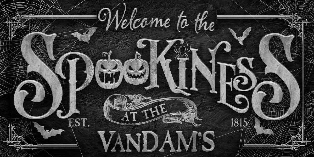 Spookiness Halloween Wall Decor on stone black and webs.