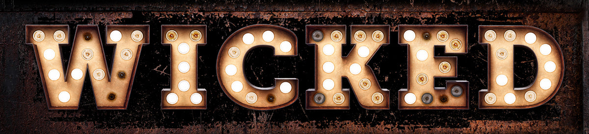 Wicked Witch Halloween Sign with faux marquee lights that say Wicked