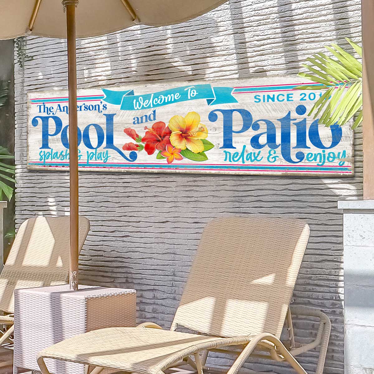 Pool and Patio Sign Personalized on white washed wood with the words [family name] Pool and Patio with tropical flowers and the words splash play, relax and enjoy - pool signs