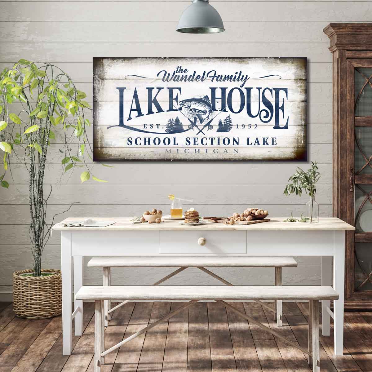 Lake House Sign with custom family Name that is on rustic old wood and the words [family Name] Lake House, establish date, the lake name, and the state, with a big picture of a bass and fishing rods