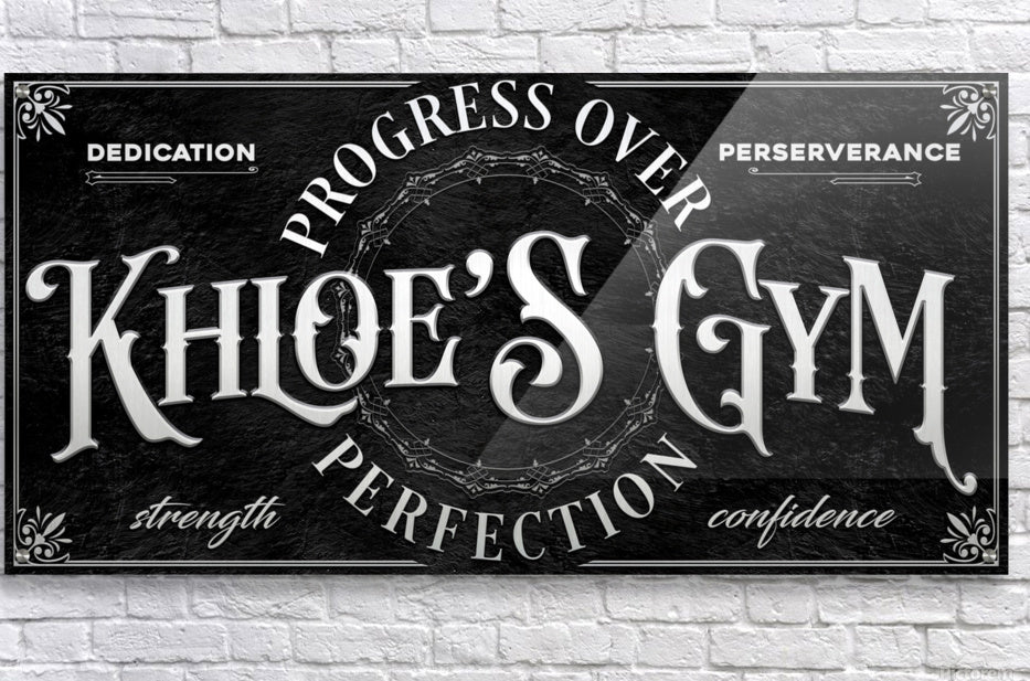 Personalized Gym Wall decor on black background with name and words progress over perfection home gym wall decor
