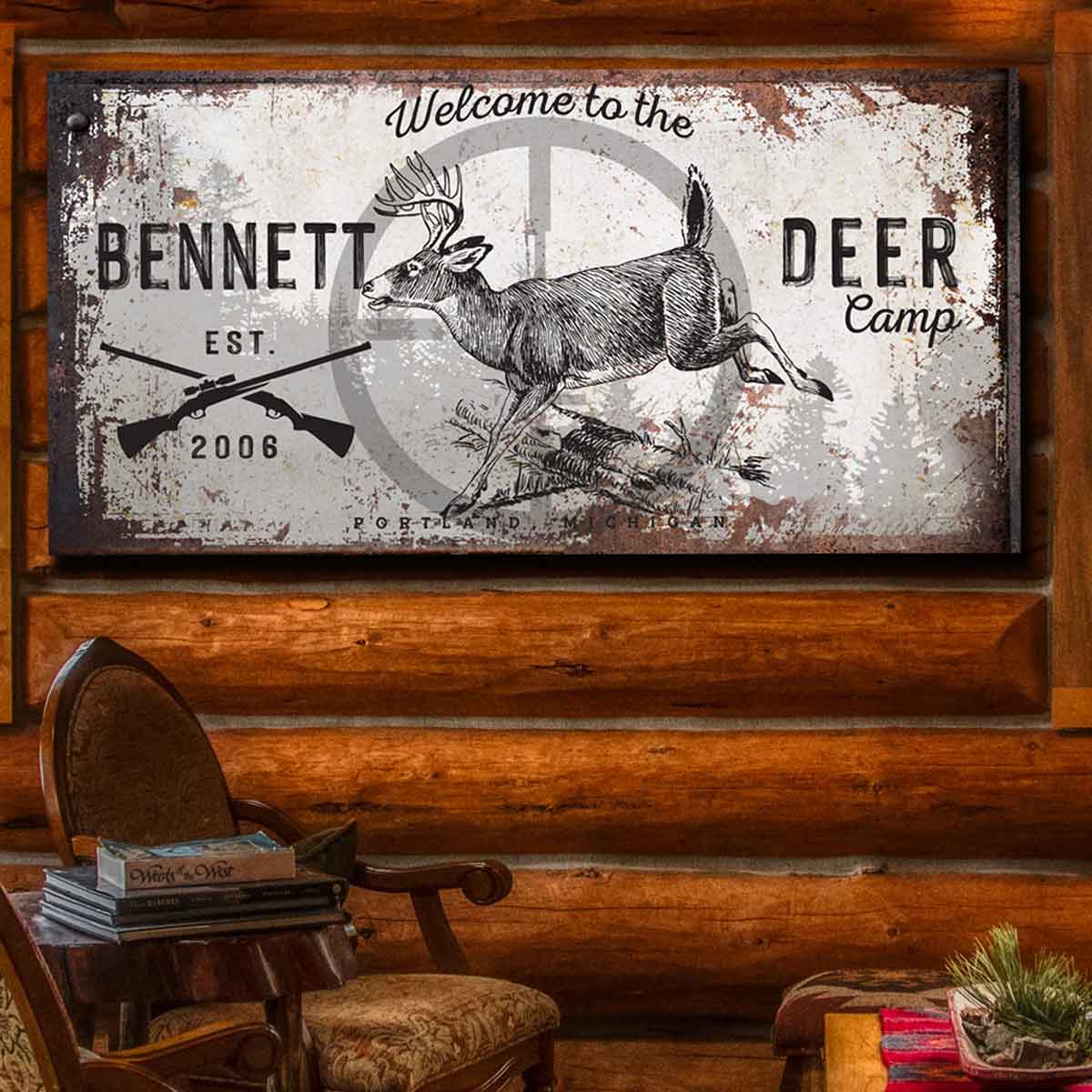 Deer cabin decor of a distressed frame with a deer in the bulls eye. 
