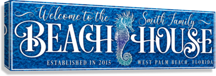Beach house sign in deep blue, with seahorse and the words Welcome to the (family name) Beach House, with est. date and city