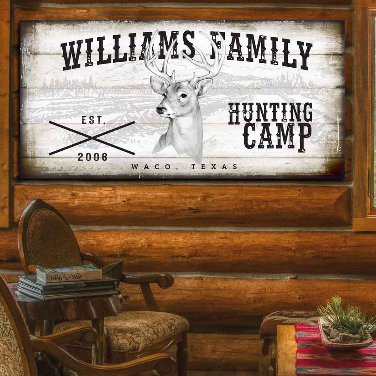Deer Camp Sign on rustic wood with family name and the words Hunting Camp