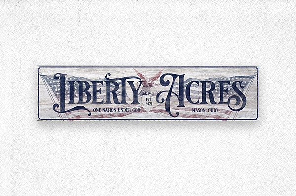 Ranch Sign in red, white and blue on metal with American Flags and a bald eagle.