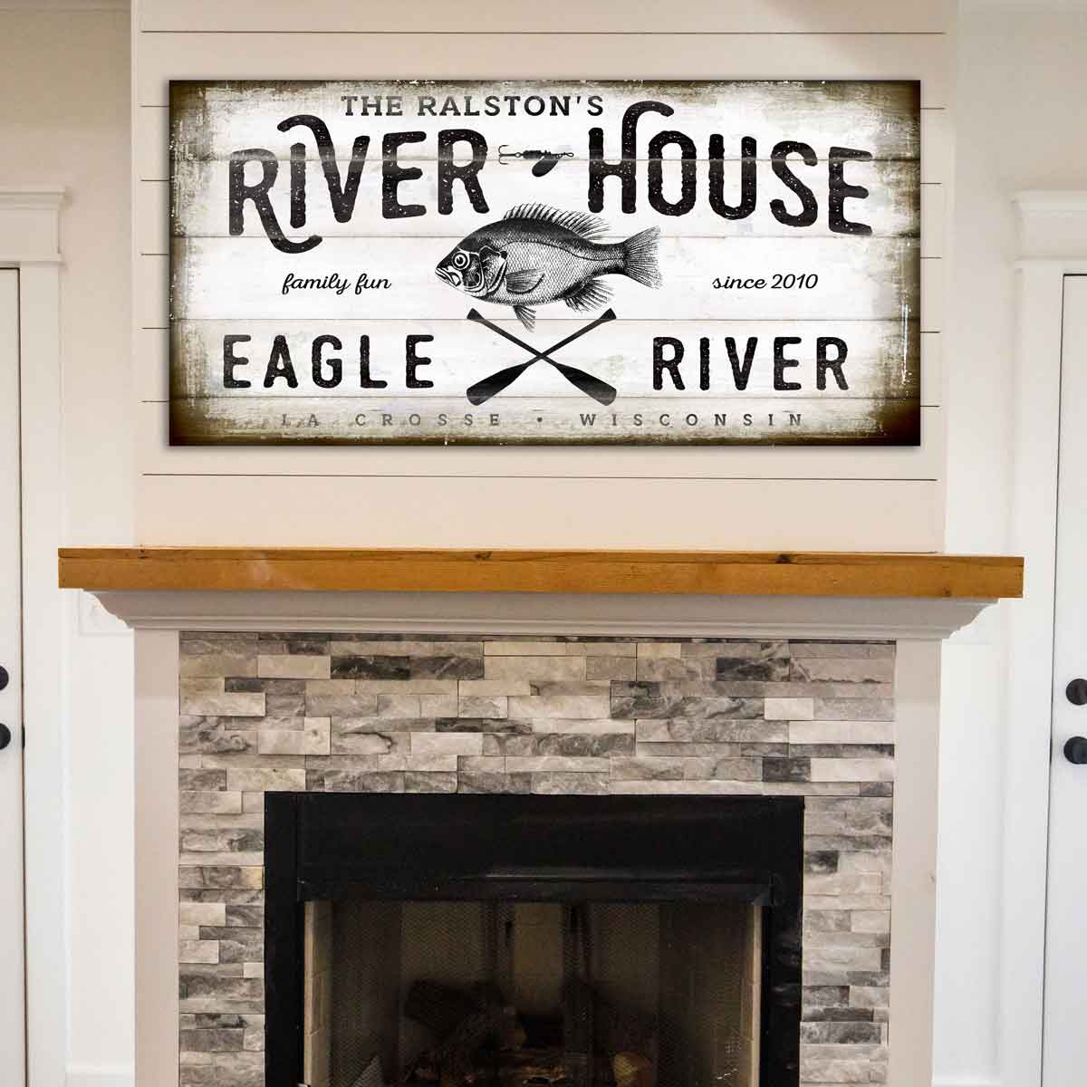 River House Sign on old plank wood with the words River House, family fun since {date}, river name, city and state with fish and paddles