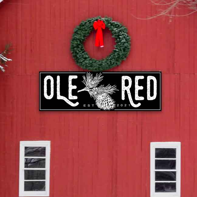 Custom Large Metal Barn Sign Reads "Ole Red" with detailed pinecone in the center of beautiful black metal barn sign