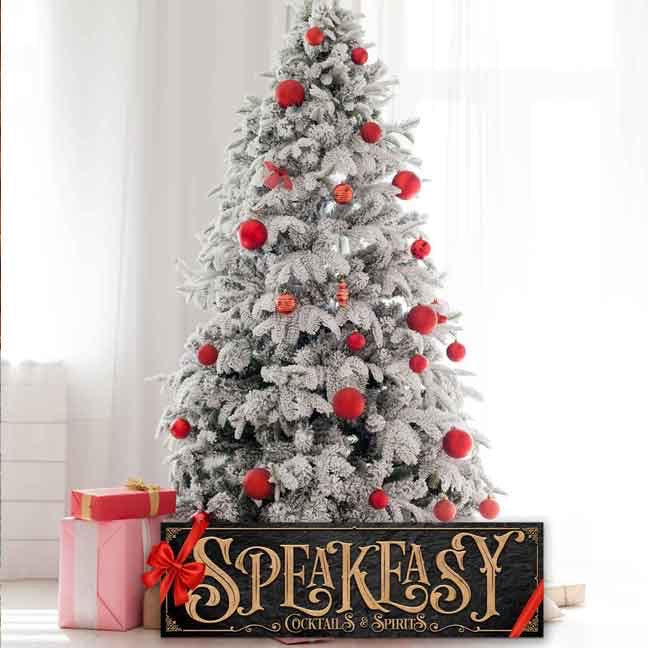 Custom Speakeasy Wall Art nestled under the Christmas tree with bow as a personalized Christmas gift. 