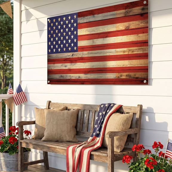 Wooden bench with American flag decor on a porch with a large wooden American flag wall art.