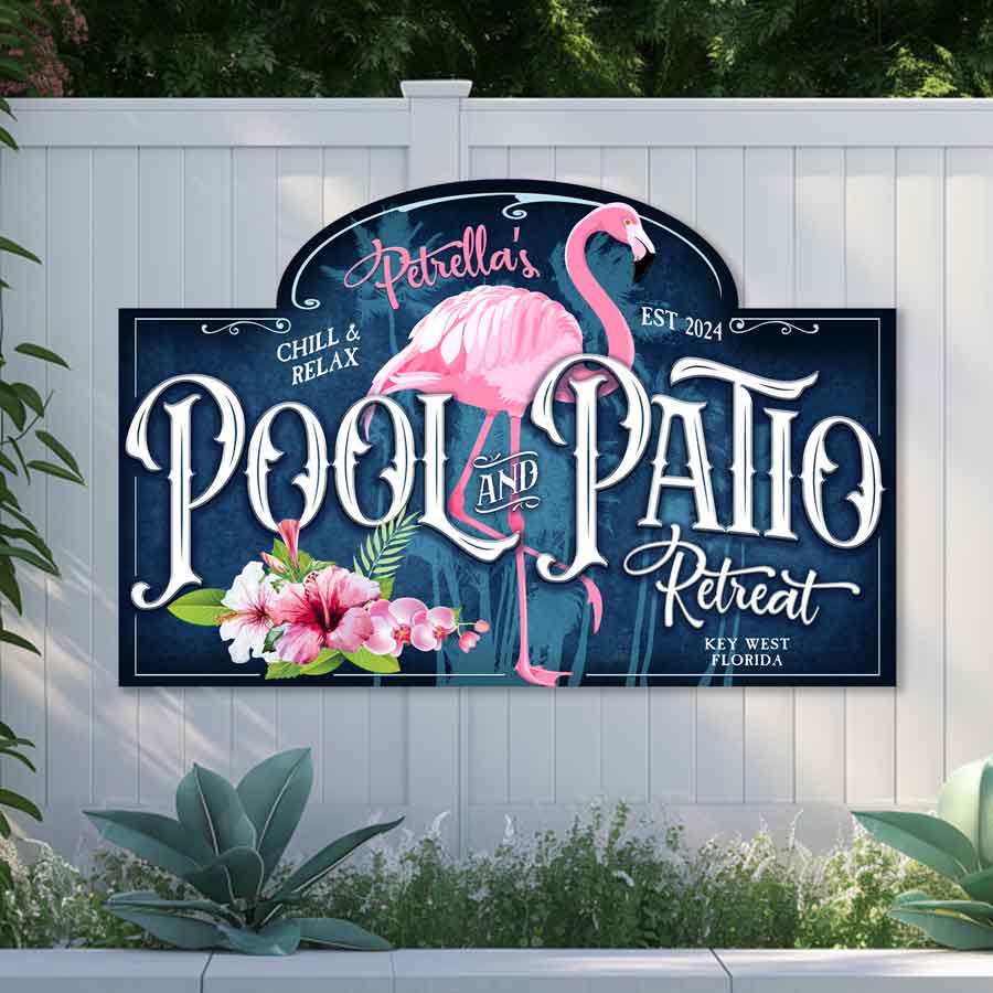 custom pool sign with blue background and a pink flamingo and the words - (family name) Pool and Patio