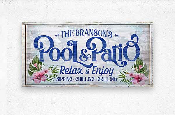 Pool and Patio sign personalized with family name and the words Pool and Patio relax and enjoy.