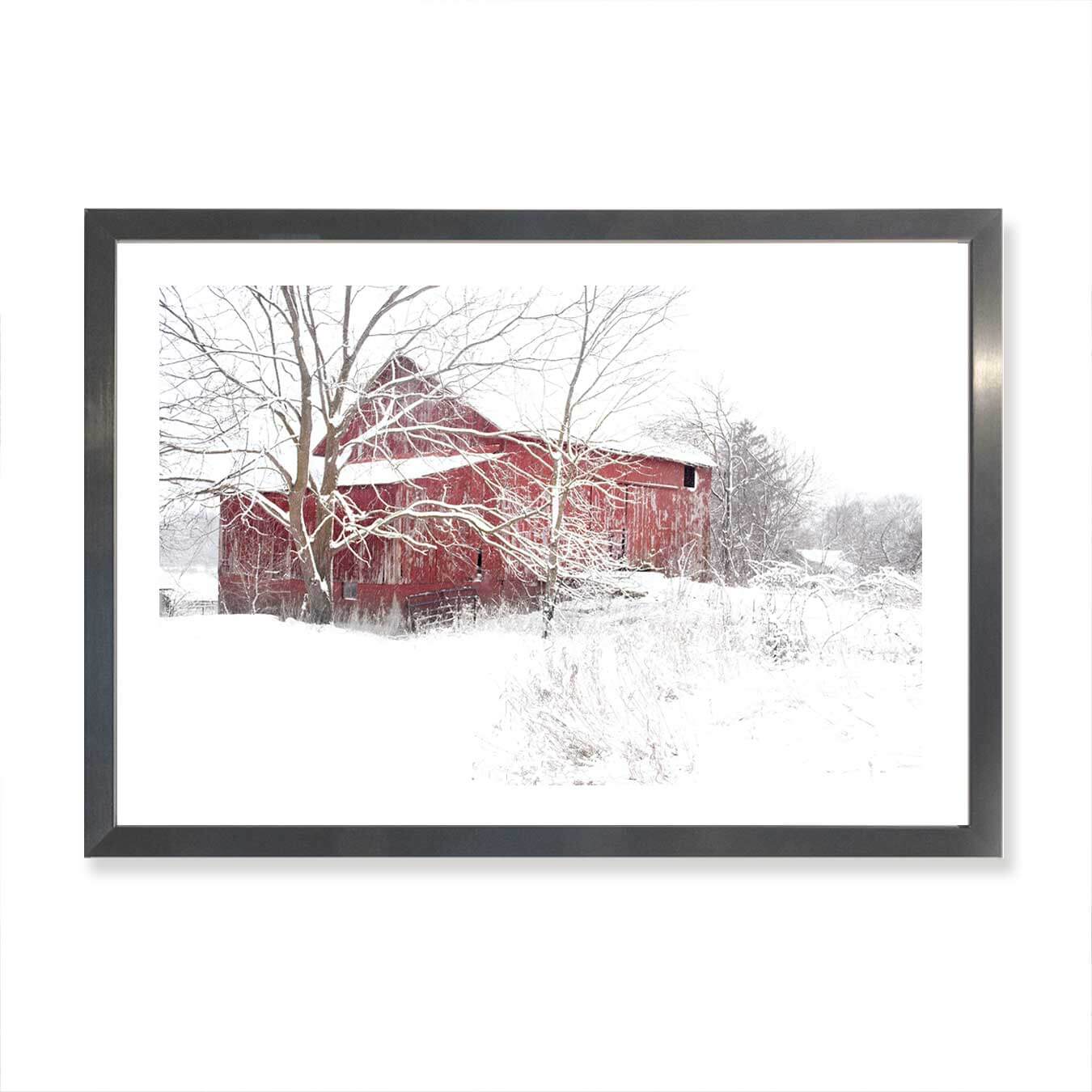 red barn on a snowy day art print with black frame