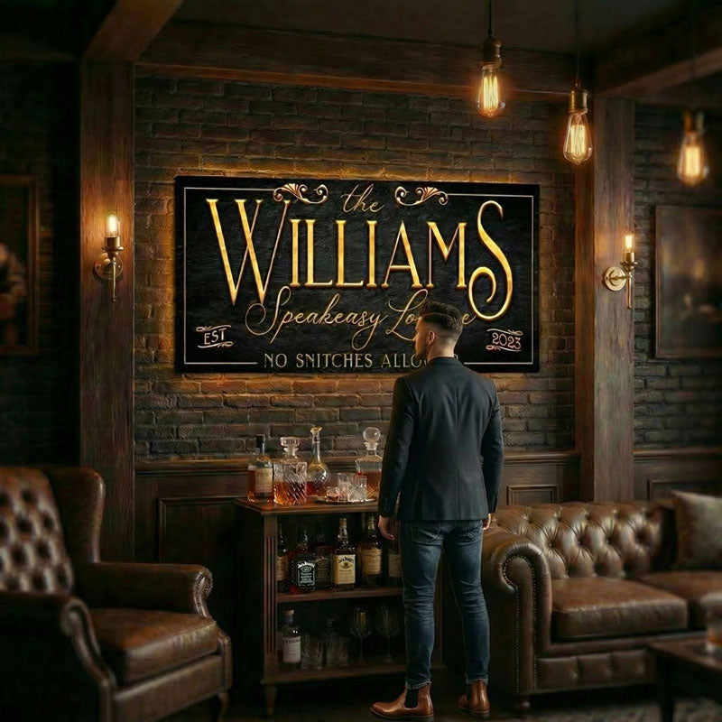 Man standing in a bar with a sign reading 'The Williams Speakeasy' on a brick wall.