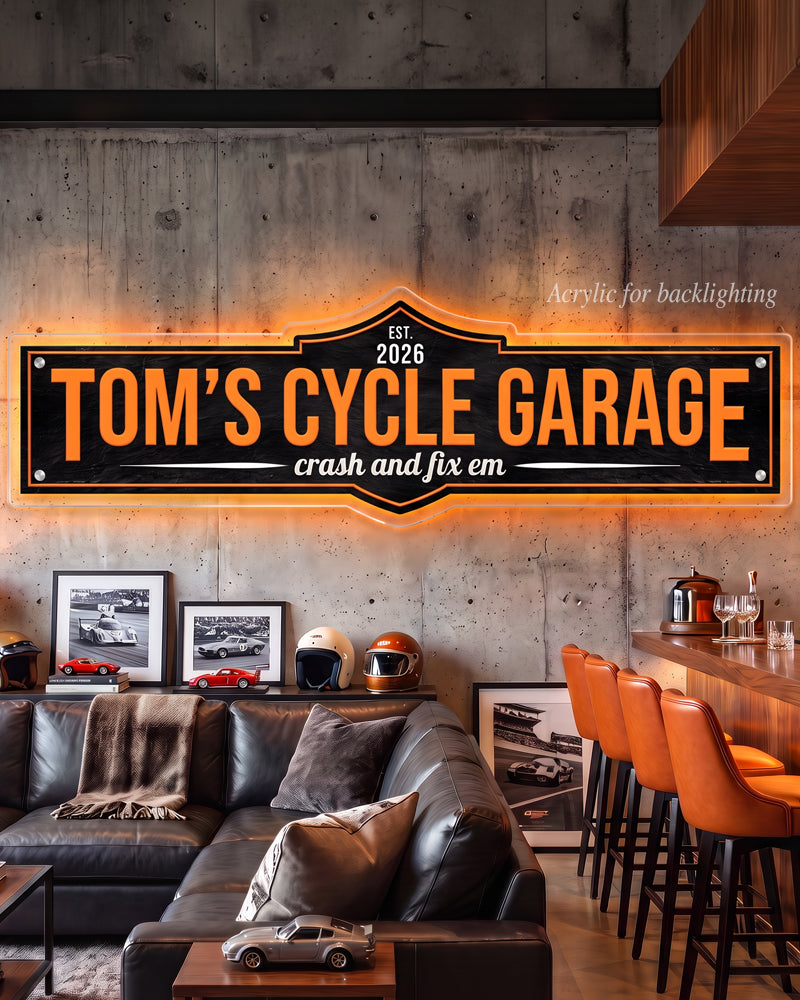 Backlit man cave sign, personalized acrylic garage sign glowing orange from behind in a man cave lounge