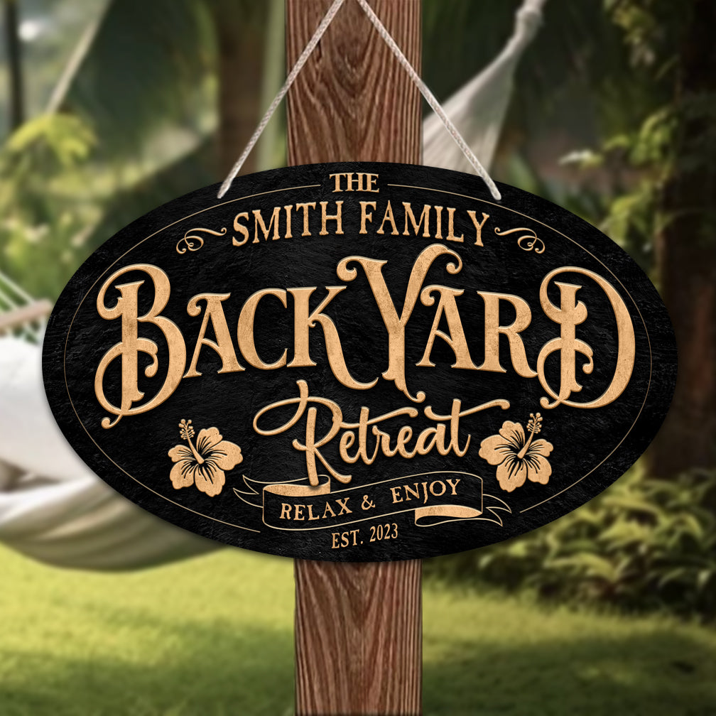 patio sign on black textured background with the words Backyard retreat personalized
