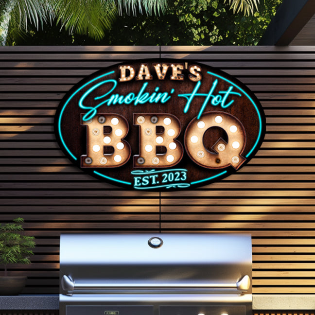 Bar and grill sign on rusty brown oval  with marquee name and BBQ letters and faux neon lights