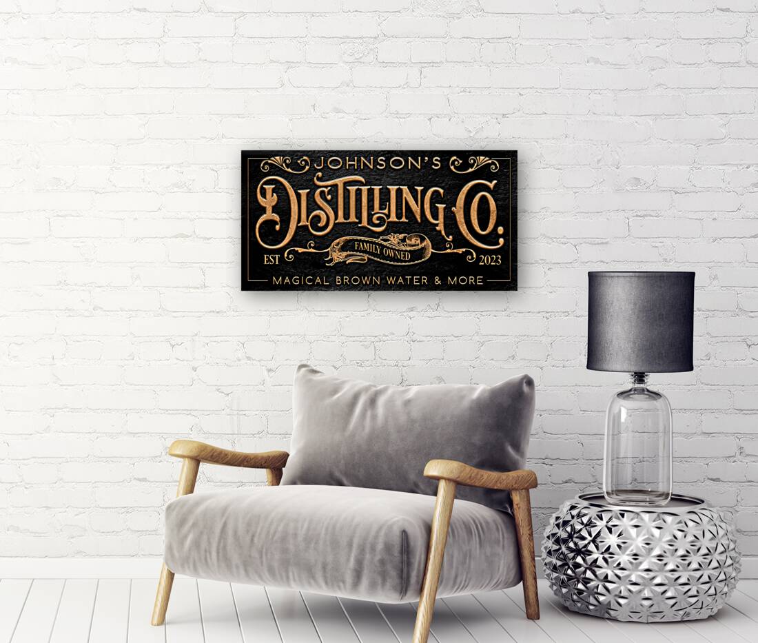 Personalized Bar Sign on black stone background with words Distilling Co. on it.