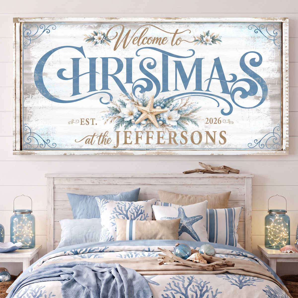 Beach Christmas sign hung above a bed with blue coral bedding and a starfish pillow