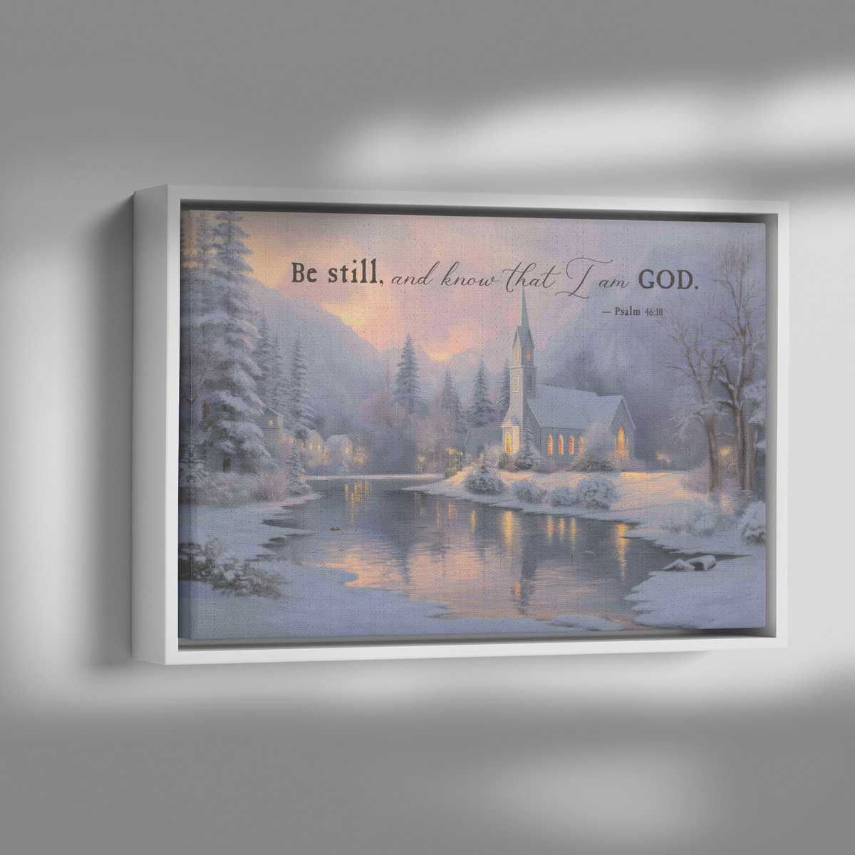 Psalm 46:10 scripture canvas in a black frame shown with dramatic side lighting