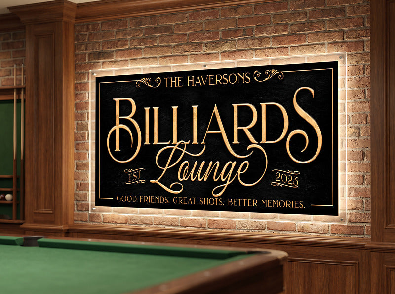 Billiards room sign on a brick wall above a pool table, personalized with a family name and established year