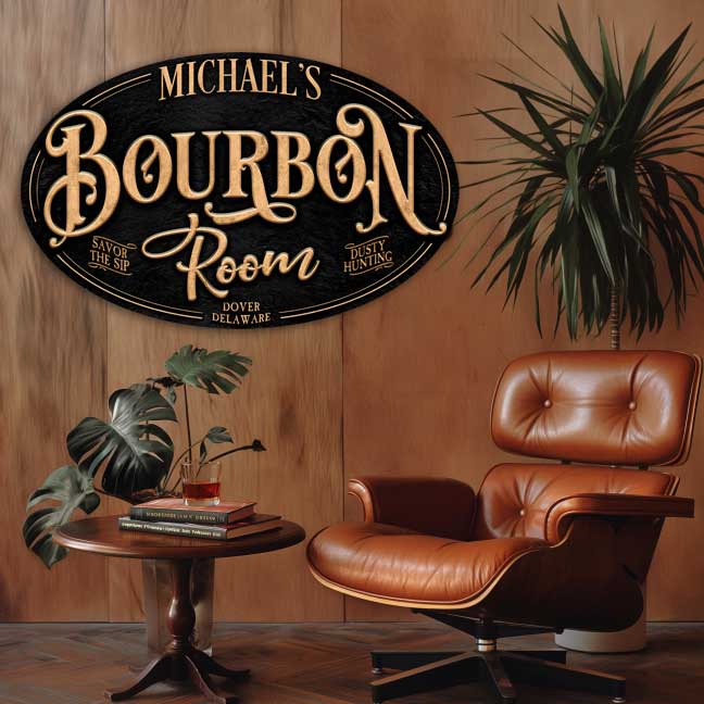 Bourbon Room Bar Decor on black textured oval with gold letters