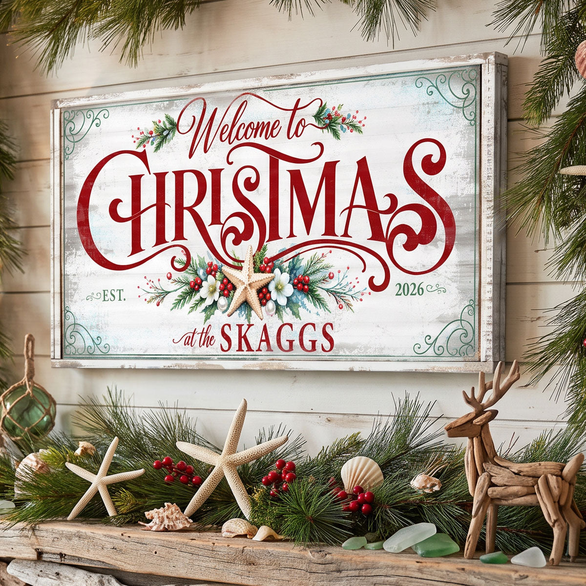 Personalized farmhouse Christmas sign on a driftwood mantel with starfish, red berries and a wooden reindeer