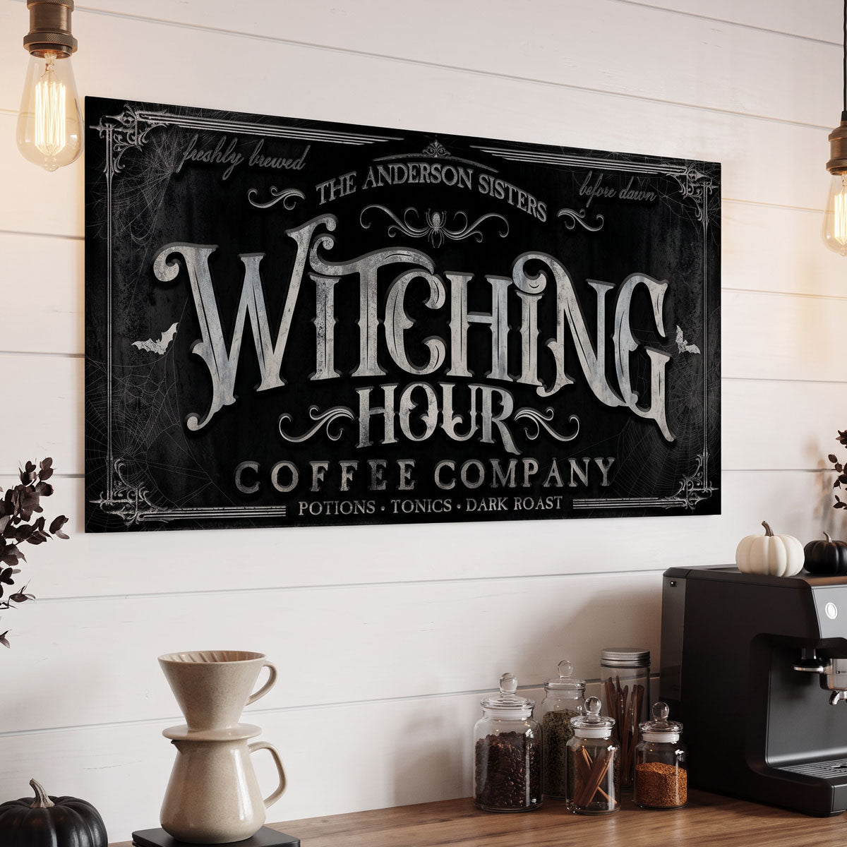 Witching Hour coffee sign on white shiplap above a coffee station with a pour over set and bean jars
