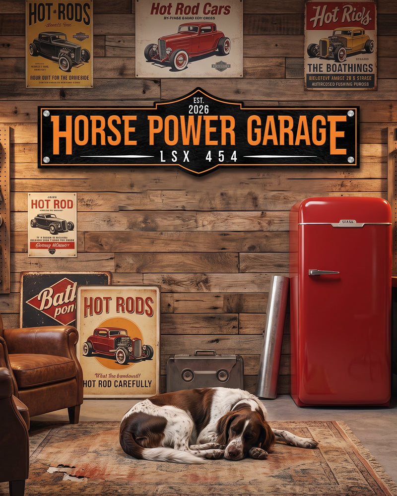 Custom metal garage sign on a wood plank wall with vintage hot rod posters and a red retro fridge