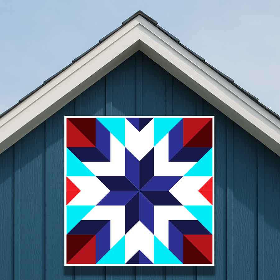 Cyan metal barn quilt, eight point star in navy, royal blue, red and white on a blue barn gable