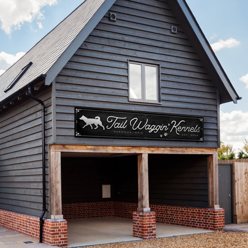Dog Kennel Sign mounted on building