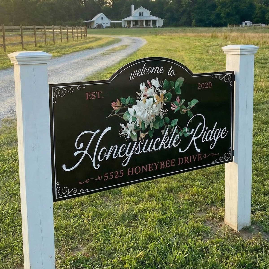 driveway sign at the end of the drive with name  and address
