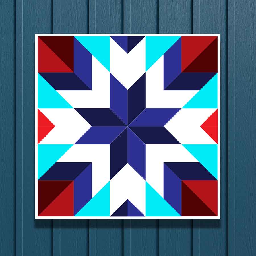 Eight point star barn quilt close up in cyan, navy, red and white on metal