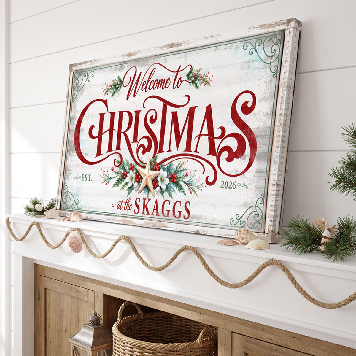 Family name Christmas sign leaning on white planks above a wood console with a rope garland