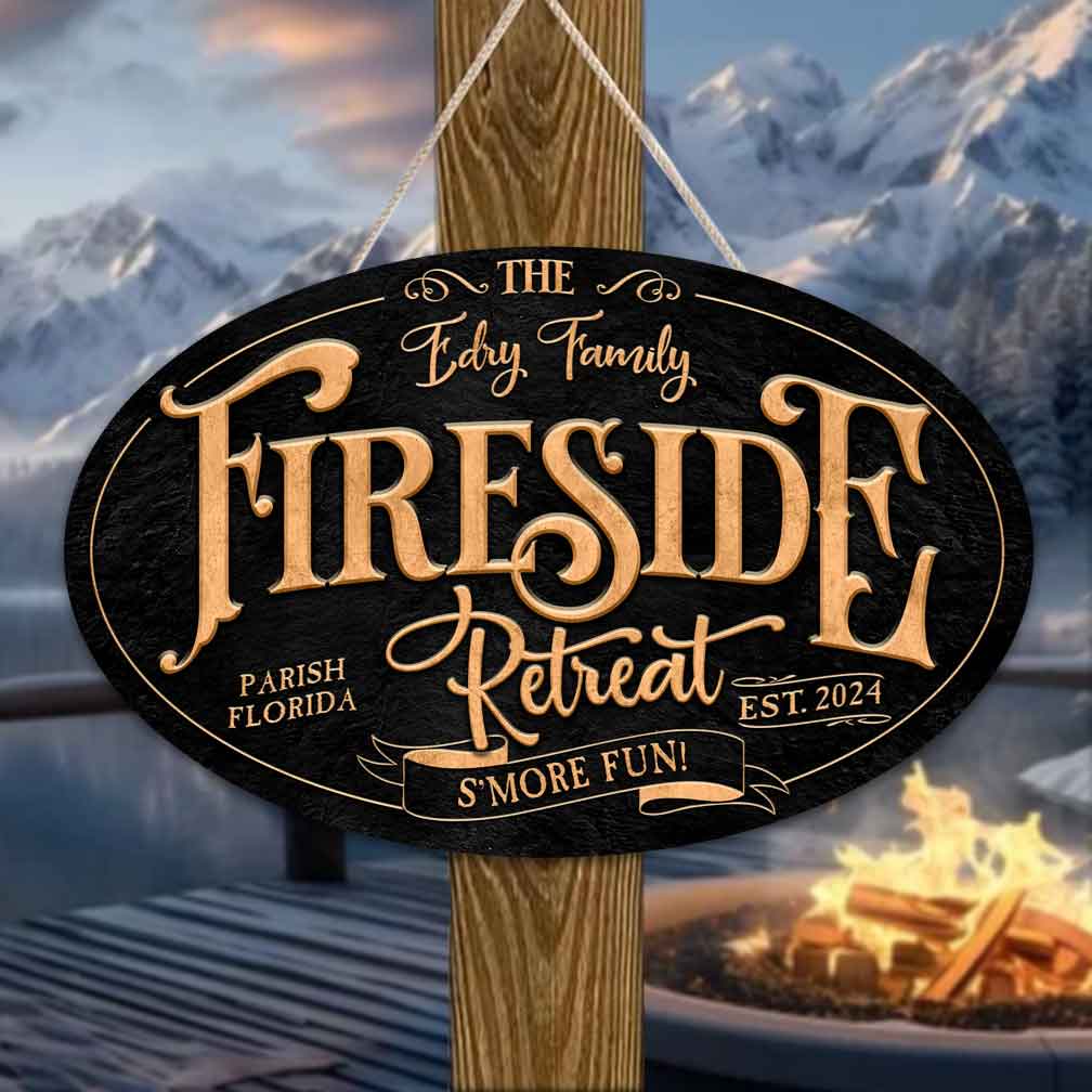 firepit-sign that is black textured with oval shape and the words fireside Retreat